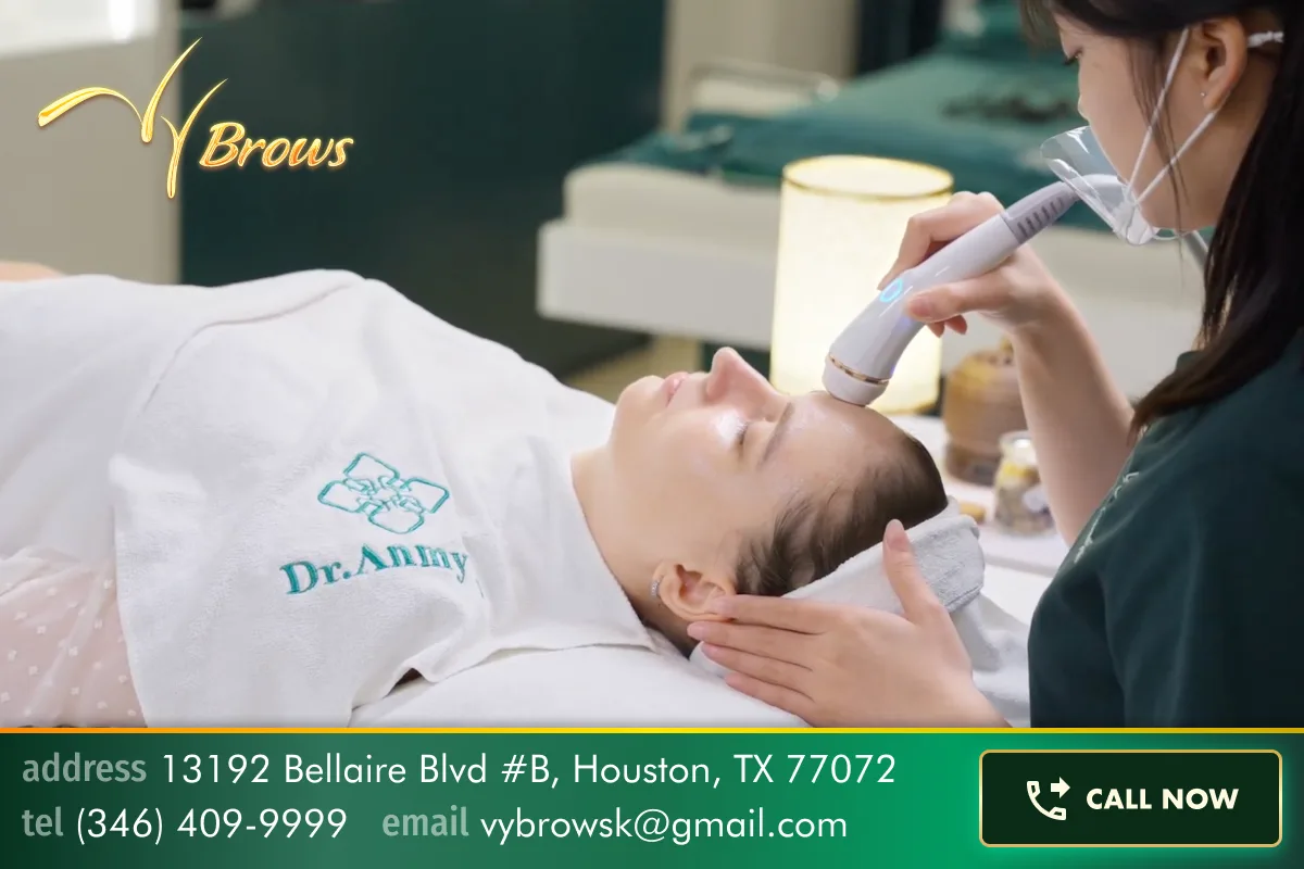 Professional FACEWASH facial treatment at VyBrows Beauty Houston — licensed esthetician using advanced ultrasound skin device for deep cleanse and detox